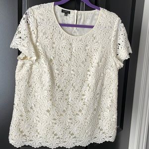 Cream colored lace short sleeve blouse new without tag.